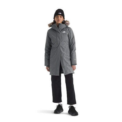 Women’s long insulated winter parka featuring a water-repellent outer shell, warm insulation, adjustable hood with faux-fur trim, full-length front zipper, storm flap, multiple pockets, and adjustable cuffs for cold-weather protection