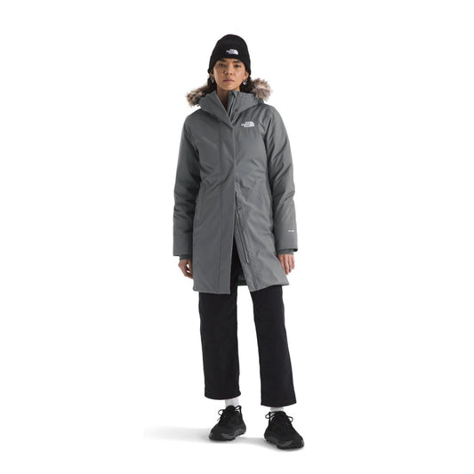 Women’s long insulated winter parka featuring a water-repellent outer shell, warm insulation, adjustable hood with faux-fur trim, full-length front zipper, storm flap, multiple pockets, and adjustable cuffs for cold-weather protection