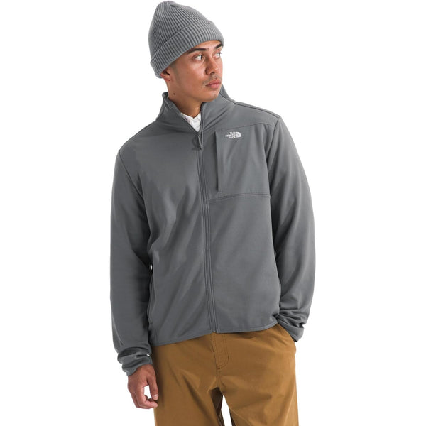 The North Face Men’s TNF Performance Fleece Full Zip Jacket in black, featuring a stand collar, full front zipper, and embroidered logo on the chest.