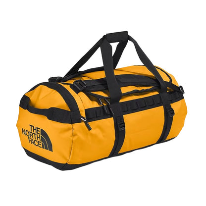 The North Face Base Camp Duffel Medium featuring a rugged water-resistant shell, spacious interior, and multiple carry straps for travel and outdoor use.