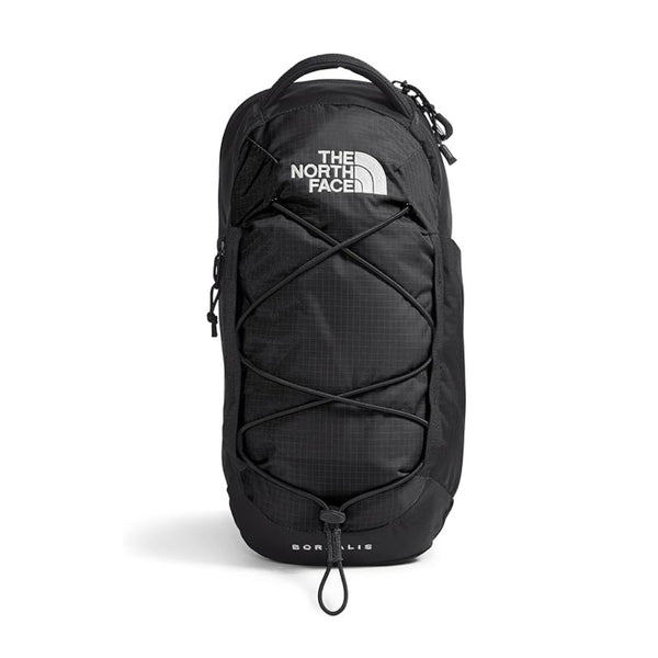 Compact Borealis sling bag with adjustable shoulder strap and zippered compartments, designed for everyday carry and travel.