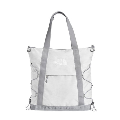 The North Face Borealis Tote Bag featuring spacious main compartment, padded laptop sleeve, durable recycled fabric, and comfortable shoulder straps for everyday carry.