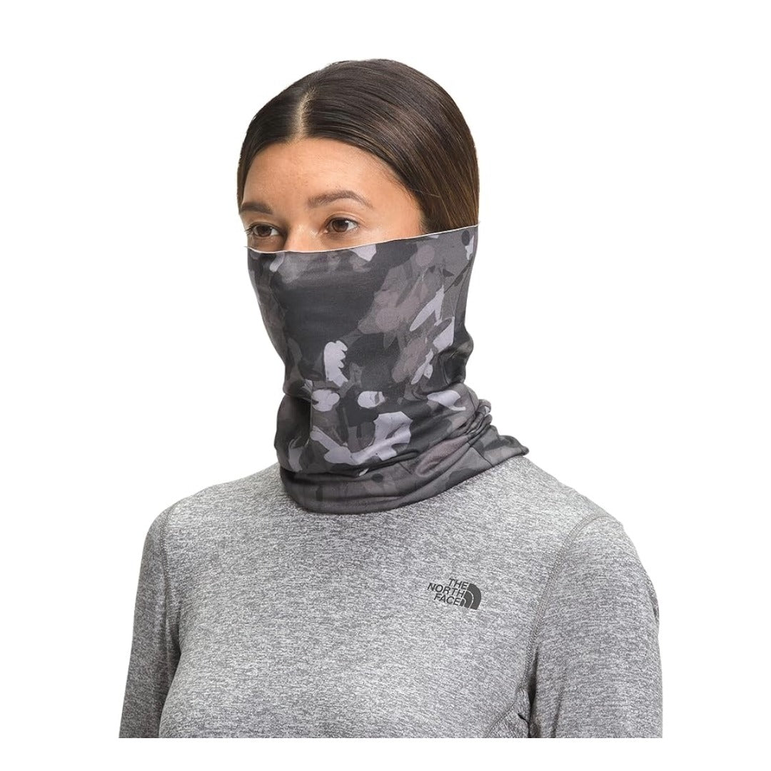 The North Face Dipsea Cover It lightweight neck gaiter with stretch fabric, breathable design, and versatile multi-wear coverage.