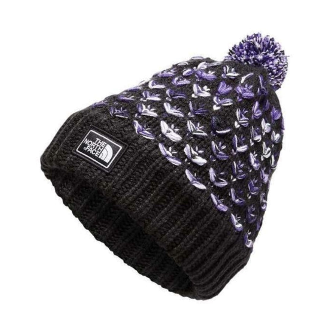 The North Face Girls Chunky Pom Beanie featuring thick knit texture, fold-over cuff, embroidered logo patch, and pom detail for cozy winter wear.