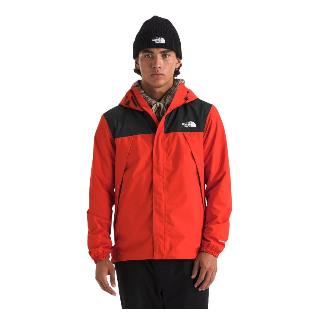 Men wearing a waterproof Antora jacket with adjustable hood and zippered pockets, designed for rain and wind protection.