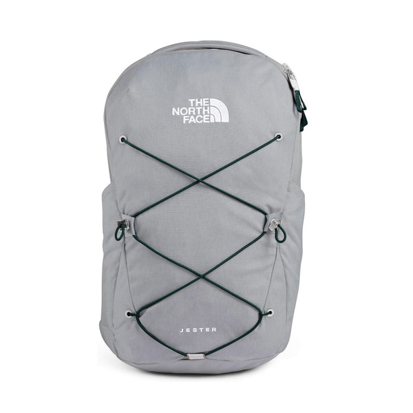 The North Face Jester backpack featuring a classic design with padded shoulder straps, front organizational pocket, and dual water bottle pockets for everyday school and travel use.