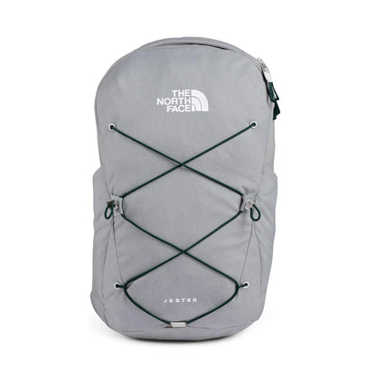 The North Face Jester backpack featuring a classic design with padded shoulder straps, front organizational pocket, and dual water bottle pockets for everyday school and travel use.