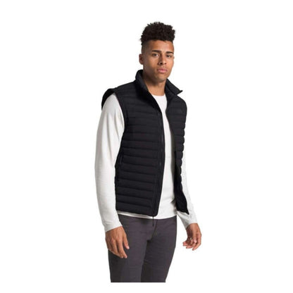 The North Face men’s Stretch Down insulated vest with stretch fabric and full-zip design, providing lightweight warmth and flexible layering for cold-weather activities.