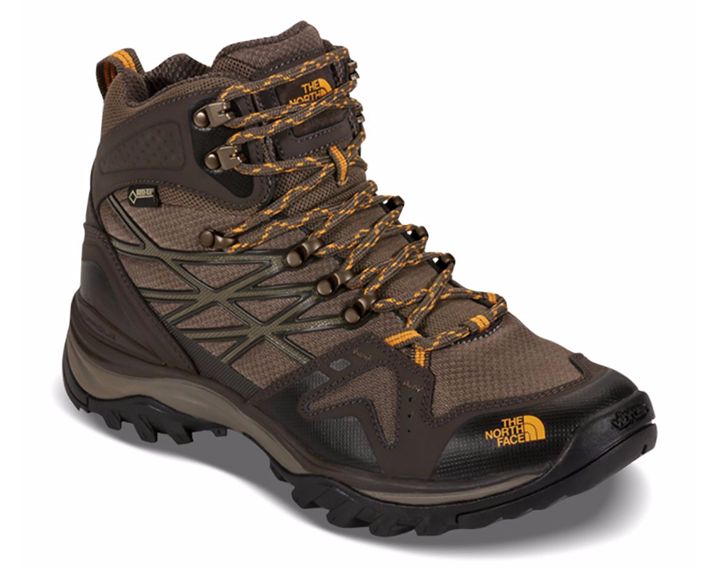 Men's mid-cut waterproof hiking boots featuring a leather and synthetic upper with a GORE-TEX® membrane, lace-up closure, reinforced toe cap, padded collar, cushioned EVA midsole, and a durable rubber outsole with aggressive trail lugs for hiking and backpacking