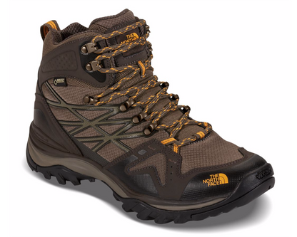 Men's mid-cut waterproof hiking boots featuring a leather and synthetic upper with a GORE-TEX® membrane, lace-up closure, reinforced toe cap, padded collar, cushioned EVA midsole, and a durable rubber outsole with aggressive trail lugs for hiking and backpacking