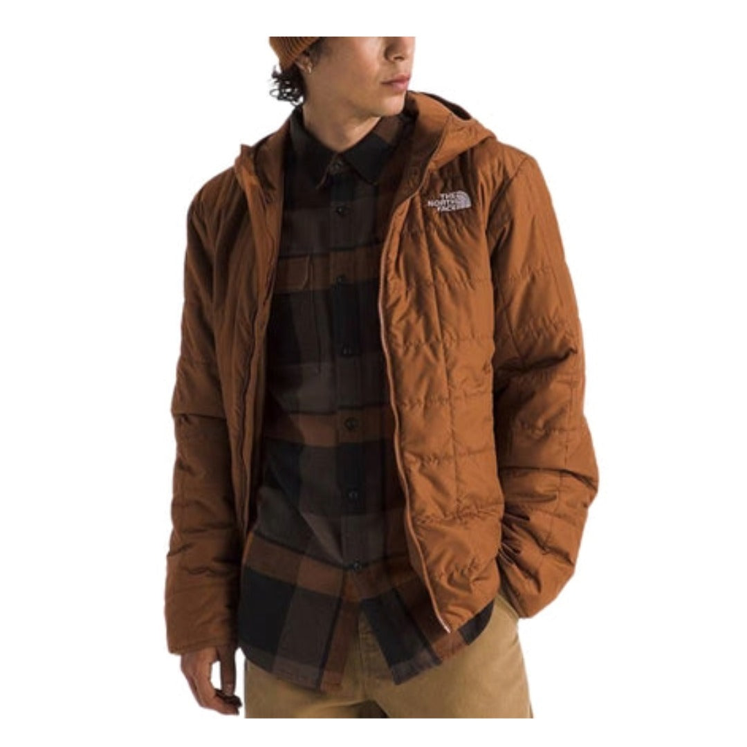 The North Face Men’s Junction Insulated Jacket in black with full-zip front, stand collar, and embroidered logo on chest.