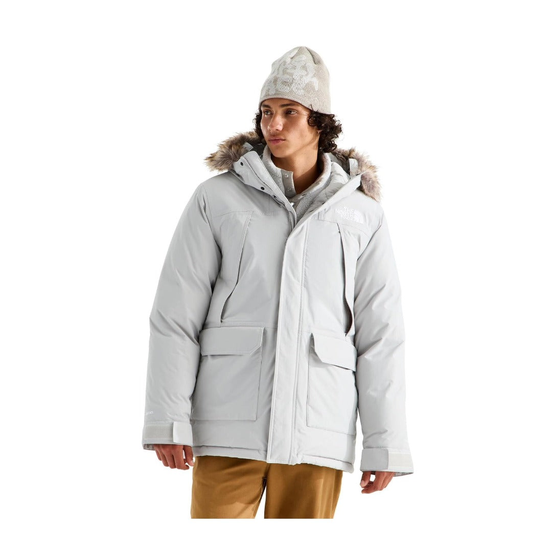Men’s long winter parka featuring a waterproof-breathable outer shell, warm insulation, adjustable hood with faux-f