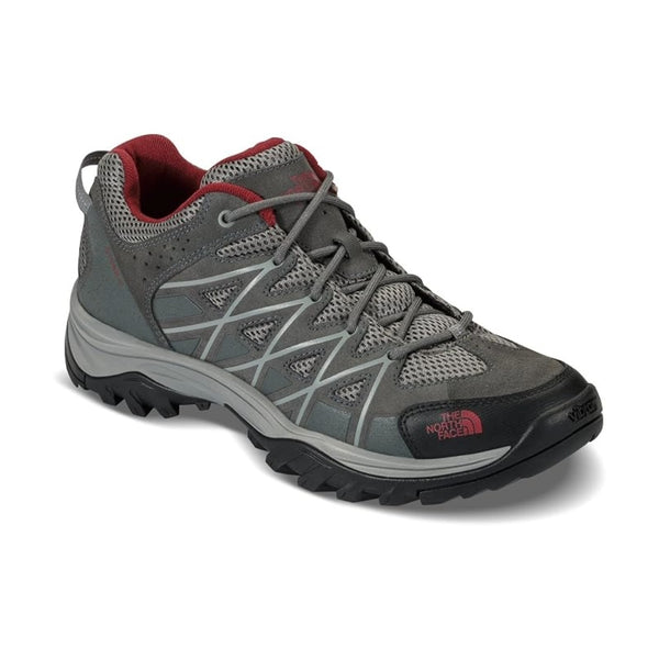 Men's waterproof outdoor boot featuring a leather and synthetic upper, lace-up closure, reinforced toe cap, padded collar, cushioned EVA midsole, and a durable rubber outsole with aggressive tread for hiking and everyday outdoor adventures