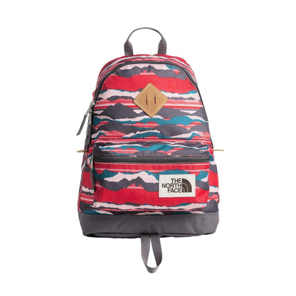 The North Face Mini Berkeley Backpack in a compact vintage-inspired design with adjustable straps, zip closure, and side pocket for everyday essentials.