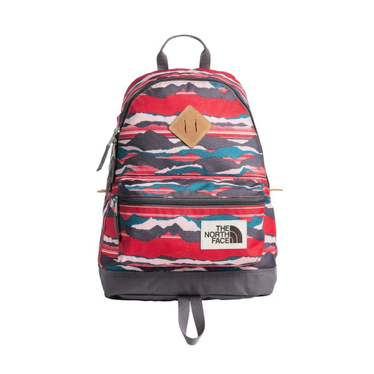The North Face Mini Berkeley Backpack in a compact vintage-inspired design with adjustable straps, zip closure, and side pocket for everyday essentials.
