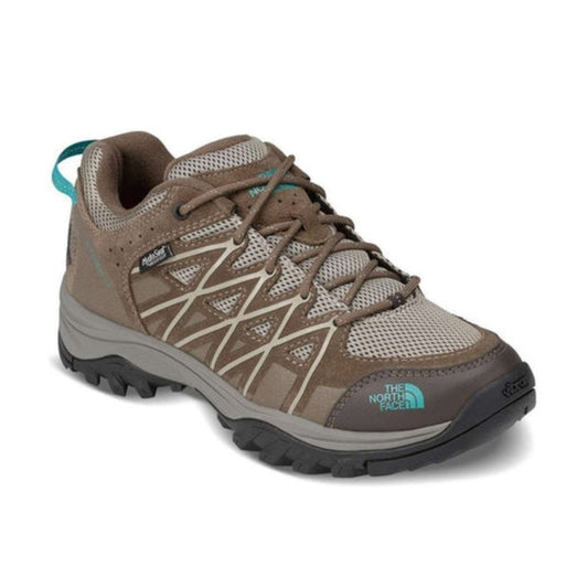 “Women’s outdoor shoes featuring a breathable textile and synthetic upper, lace-up closure, reinforced toe cap, cushioned EVA midsole, padded collar, and rugged rubber outsole for hiking and everyday adventures