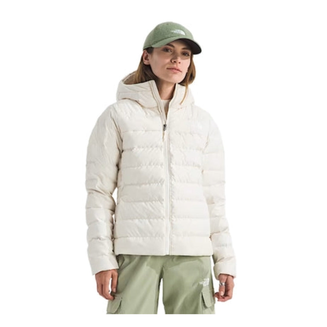The North Face Women’s Aconcagua 3 Hoodie, featuring a quilted design, full front zip, and fitted hood for warmth and comfort.

