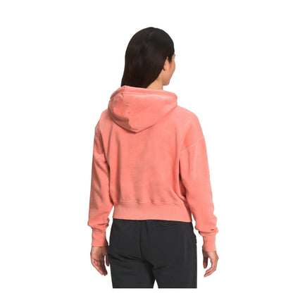 The North Face Women’s Garment Dye Hoodie with soft fleece fabric, pullover design, kangaroo pocket, and relaxed everyday fit.
