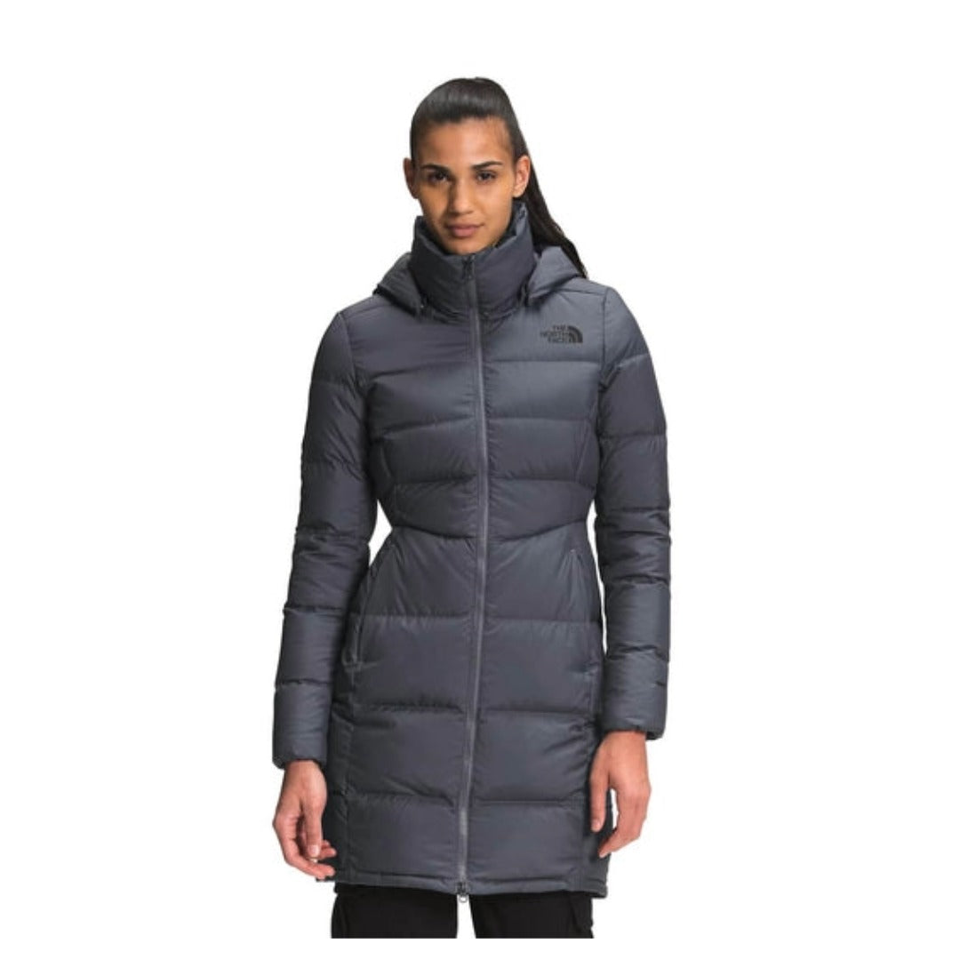 The North Face Women’s Metropolis Parka with long insulated design, sleek silhouette, and full-zip closure for winter wear.