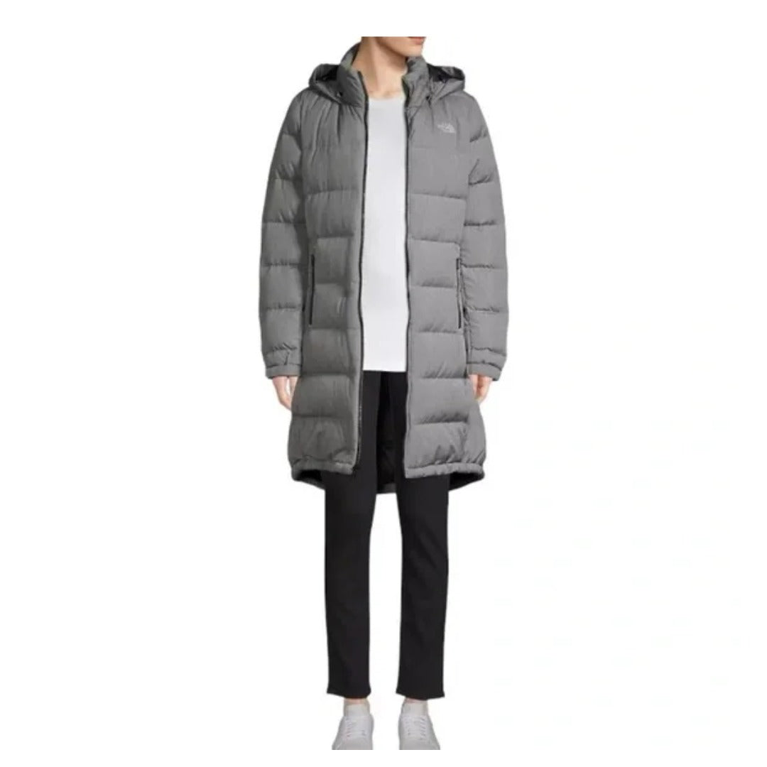 The North Face Women's Metropolis Parka III with long insulated design, sleek silhouette, and full-zip closure for winter wear.
