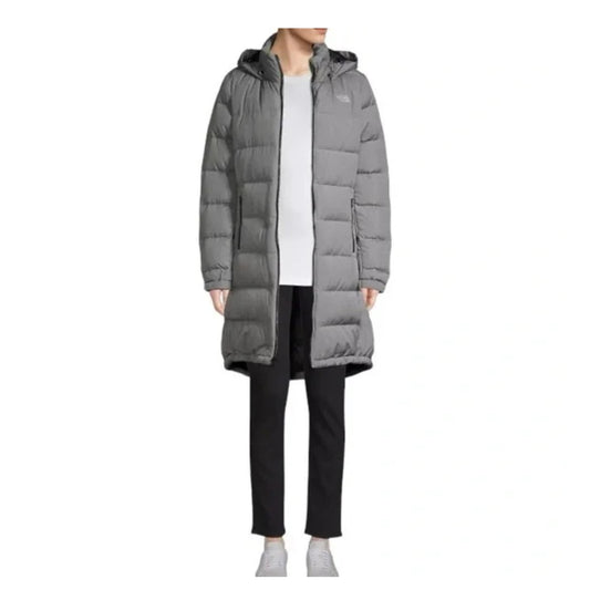 The North Face Women's Metropolis Parka III with long insulated design, sleek silhouette, and full-zip closure for winter wear.