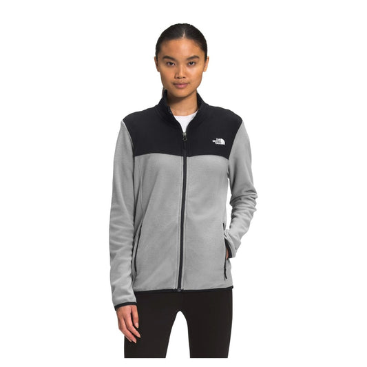 The North Face Women’s TKA Glacier Full-Zip Jacket featuring lightweight recycled fleece, full front zipper, stand collar, and zippered hand pockets.