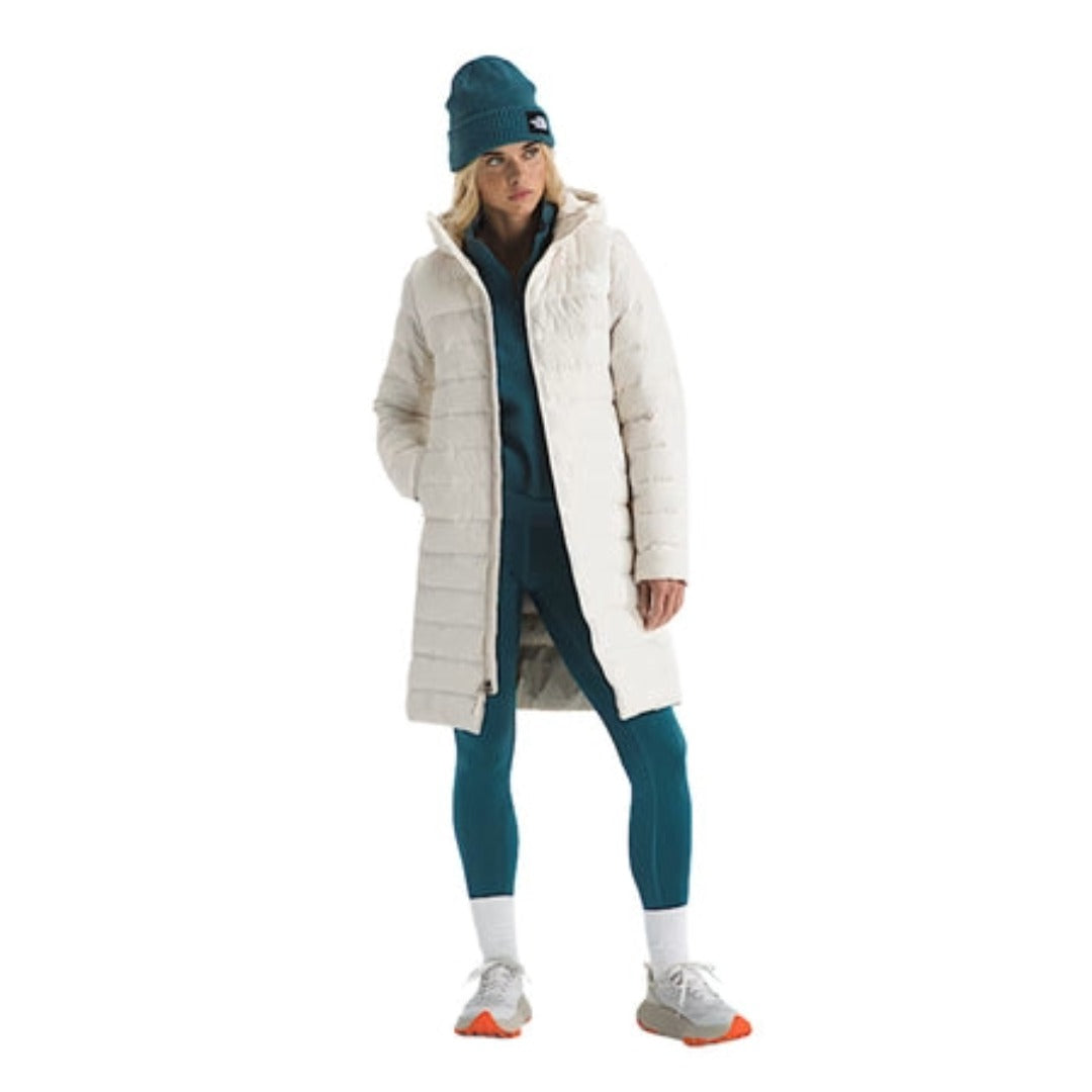 The North Face Women’s Aconcagua Parka in black, featuring a quilted, longline design with an insulated hood and full-zip front for warmth and coverage.