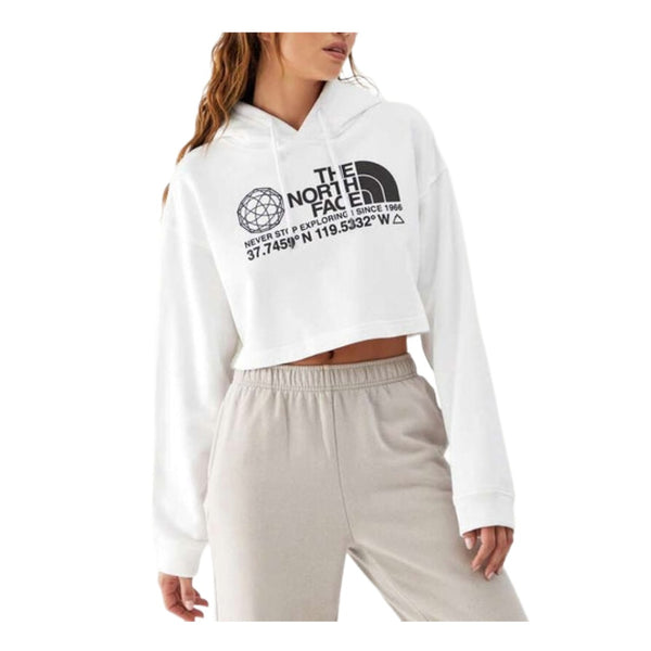 The North Face Women’s Coordinates Crop Drop Pullover Hoodie cropped cotton hoodie with drawcord hood and graphic logo design.