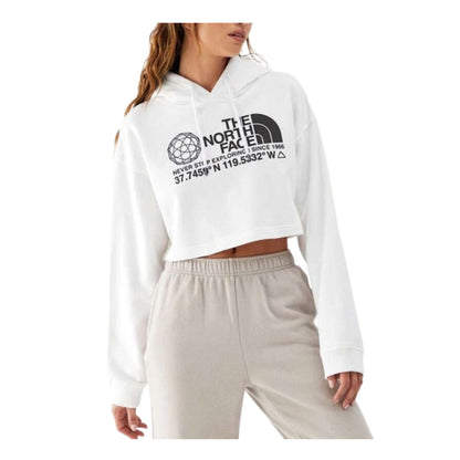 The North Face Women’s Coordinates Crop Drop Pullover Hoodie cropped cotton hoodie with drawcord hood and graphic logo design.