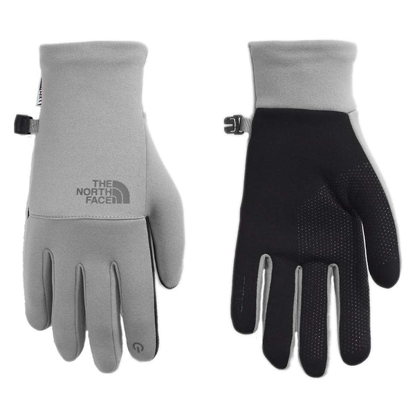 The North Face Women’s Etip Recycled Gloves featuring stretch fleece fabric, touchscreen-compatible fingertips, and silicone grip palm for everyday cold-weather use.