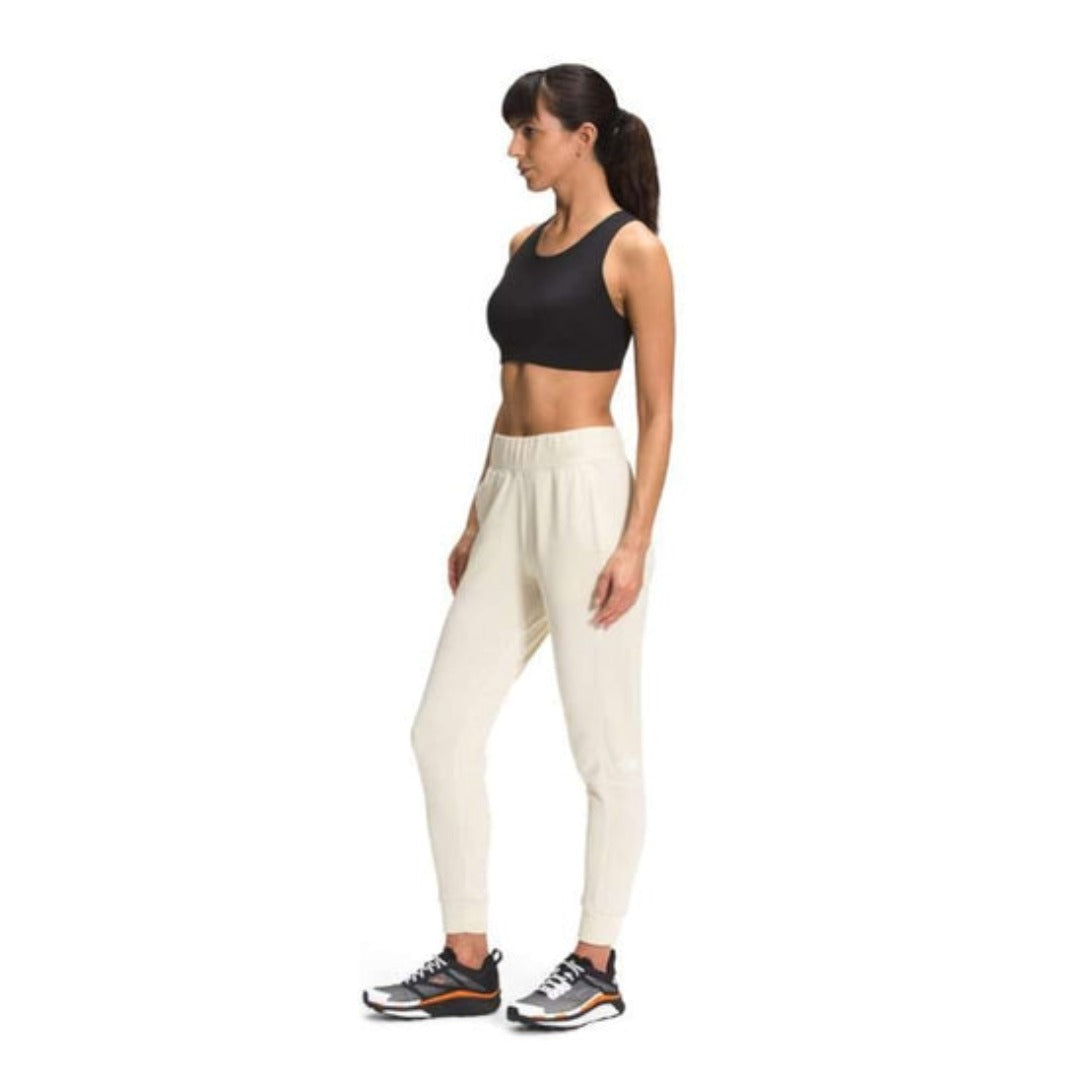 The North Face Women’s Exploration Fleece Jogger featuring soft fleece fabric, elastic drawstring waistband, tapered leg, and ribbed ankle cuffs for casual comfort.