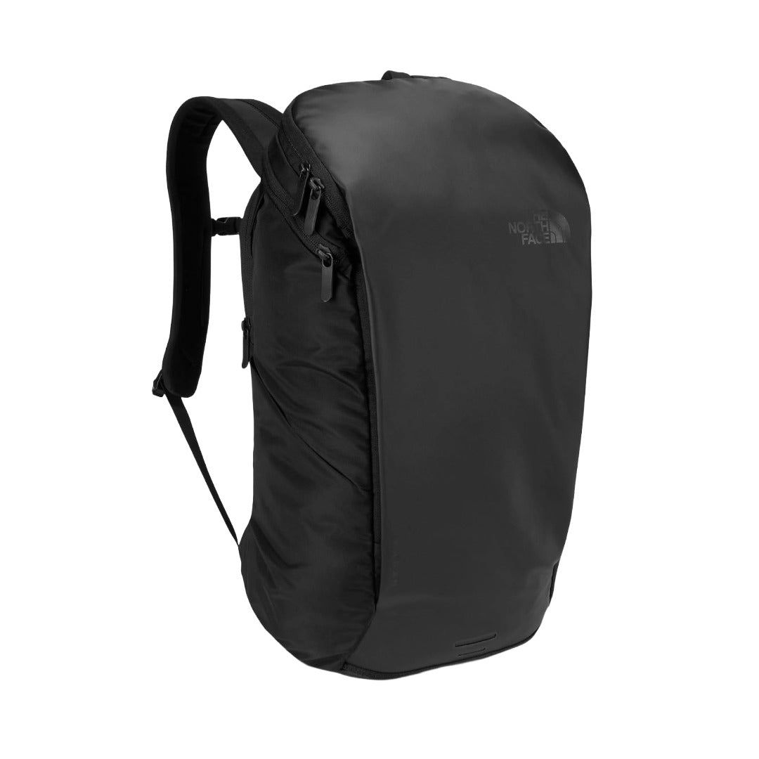 The North Face Women’s Kaban backpack with a sleek, structured design, featuring padded shoulder straps, zippered compartments, and a modern urban style for commuting and daily use.
