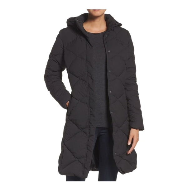 The North Face Women’s Miss Metro Parka II featuring a slim mid-thigh silhouette, quilted down insulation, removable hood, and two-way front zipper.