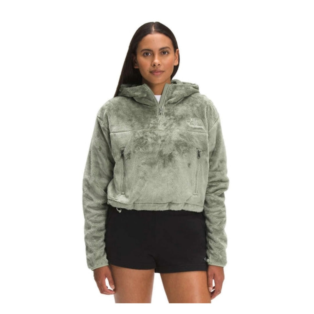 The North Face Women’s Osito 1/4 Zip Hoodie featuring ultra-soft fleece fabric, quarter-zip front, attached hood, and cozy pullover design for everyday warmth.
