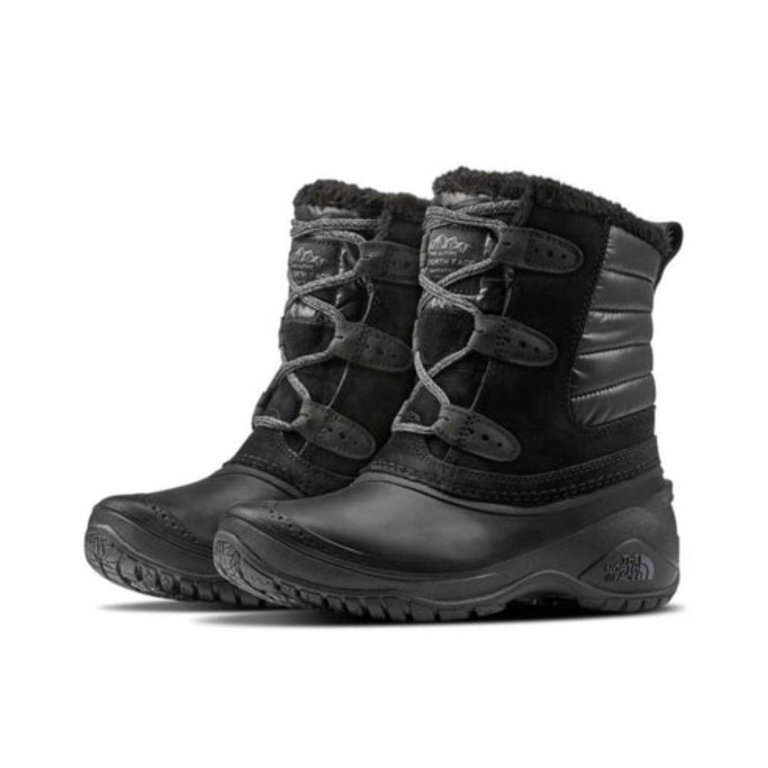 Women's waterproof short winter boots featuring a leather and textile upper, lace-up closure, soft fleece lining, synthetic insulation, cushioned EVA midsole, reinforced toe and heel, and a durable rubber outsole for cold-weather comfort and traction