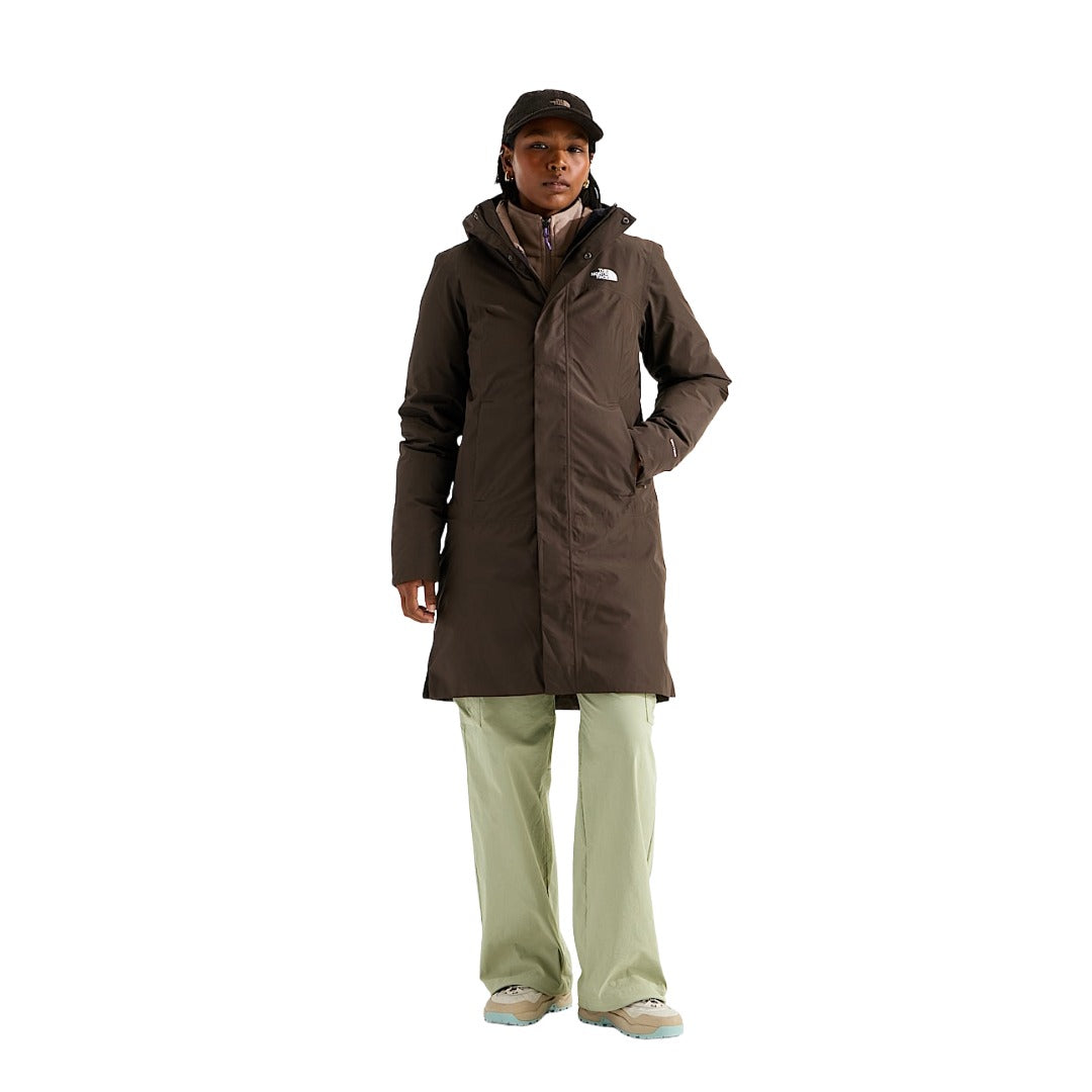 Women's 3-in-1 winter jacket featuring a weather-resistant outer shell, removable inner layer, adjustable hood, full-length zipper, and multiple pockets