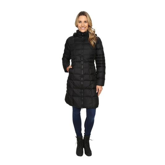 The North Face Women’s Metropolis Parka II in a long, quilted silhouette with zip closure and hand pockets, designed for lightweight warmth and everyday winter protection.