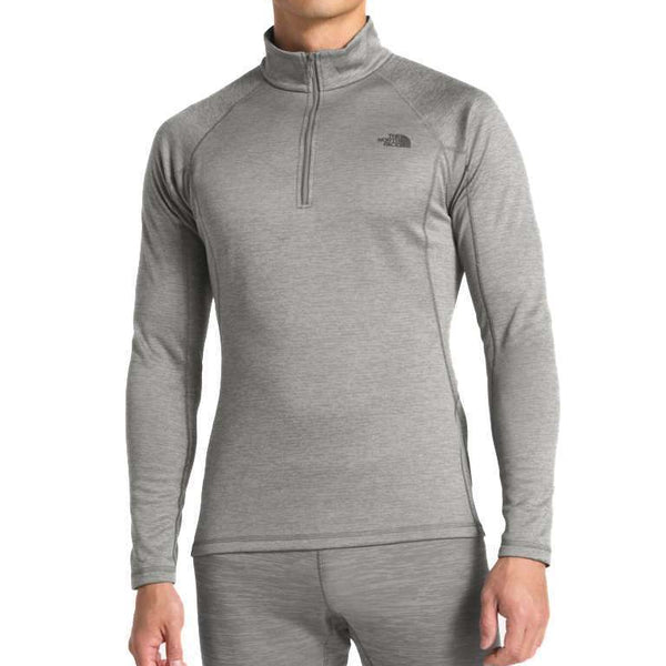 The North Face Men’s long-sleeve zip neck performance top with lightweight breathable fabric and quarter-zip collar.