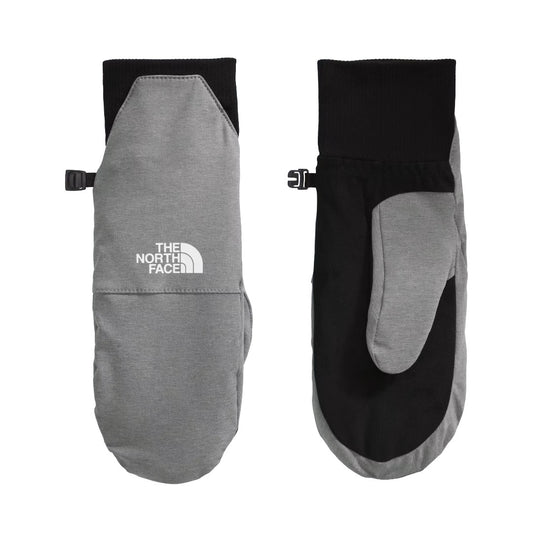 The North Face Women’s Shelbe Raschel Etip™ Mitts in black with logo detail, featuring fleece lining and touchscreen-compatible tips.