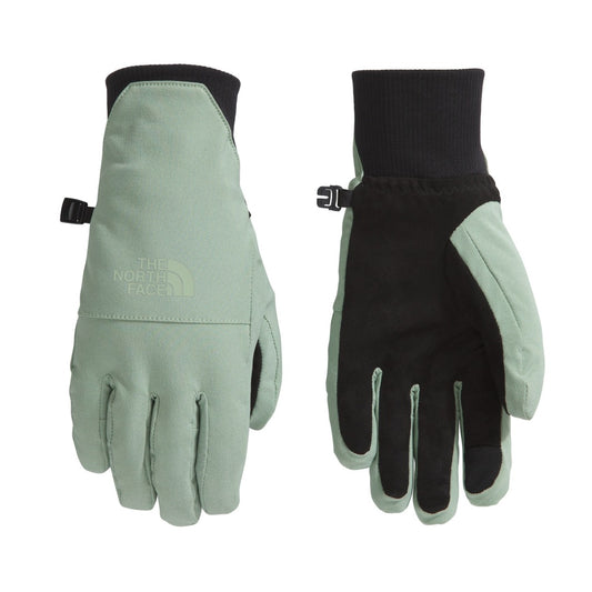 The North Face Women’s Shelbe Raschel Etip Gloves in black with logo detail, featuring a fleece lining and touchscreen-compatible fingertips.
