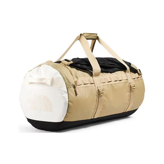 The North Face Base Camp Duffel – M in classic black with top handles, adjustable shoulder straps, and zippered D-closure design.
