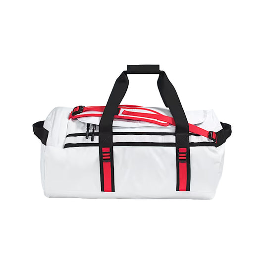 The North Face Base Camp Duffel – M in classic black with top handles, adjustable shoulder straps, and zippered D-closure design.
