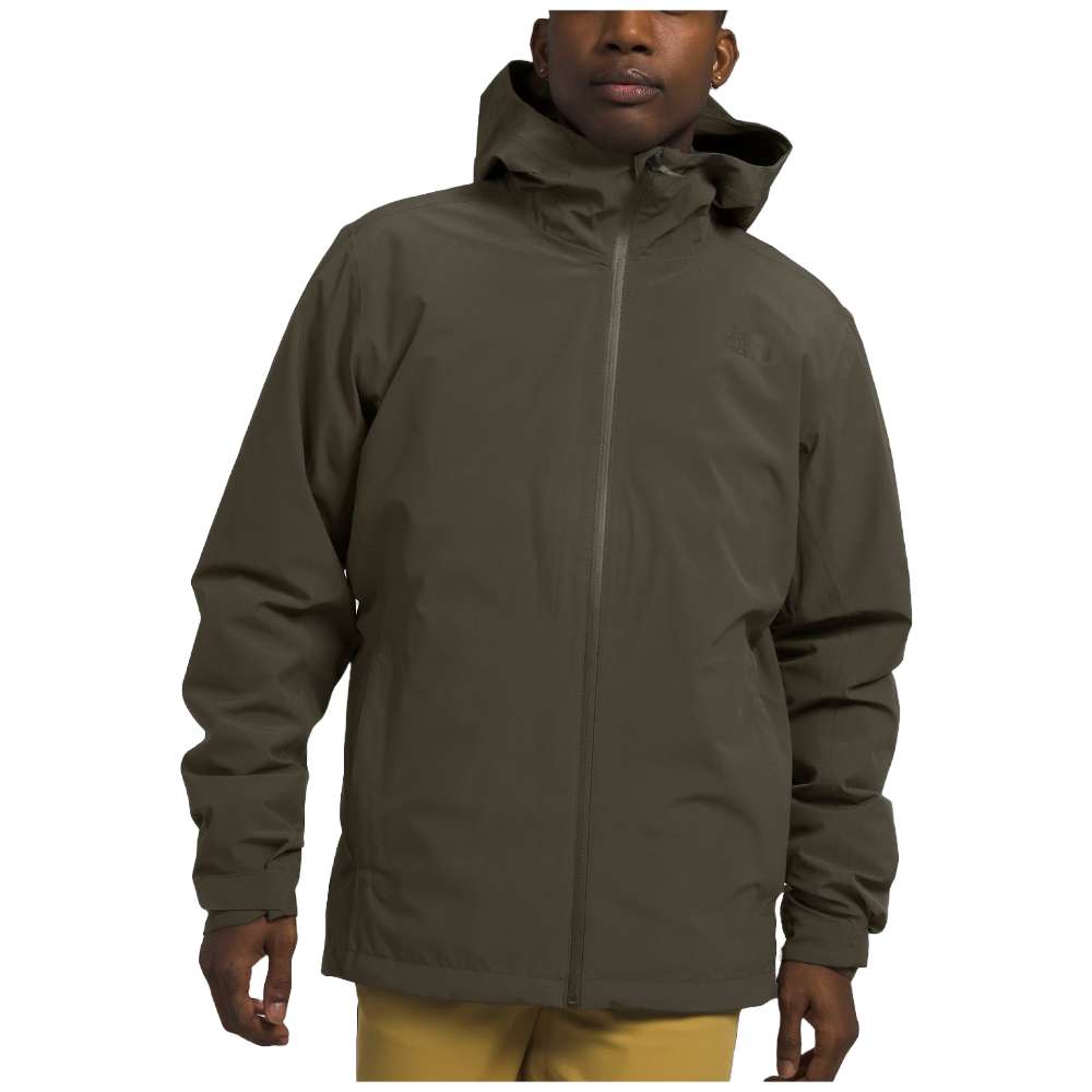 A man wearing The North Face Men’s ThermoBall™ Eco Triclimate® Jacket in taupe green, braving the elements.