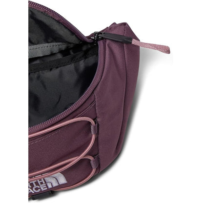 The North Face Jester Lumbar Pack in black, featuring a compact design with multiple compartments and an adjustable waist strap.
