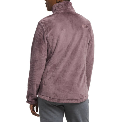 Embrace winter warmth in The North Face Women's Osito Jacket, a plush fleece layer perfect for chilly days and outdoor adventures.