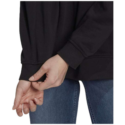 Woman in adidas Originals Women's Trefoil Essentials Sweatshirt