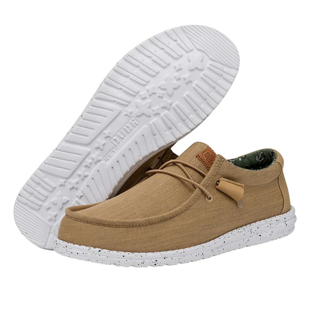 A pair of Hey Dude Men's Wally Washed Canvas shoes in walnut