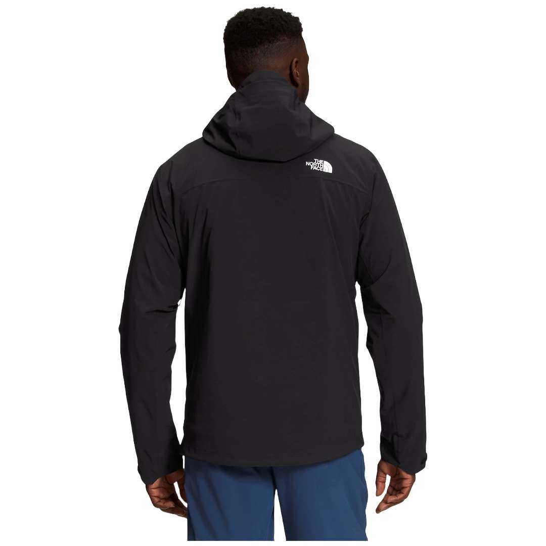 A man wearing The North Face Men’s ThermoBall™ Eco Triclimate® Jacket in TNF Black.