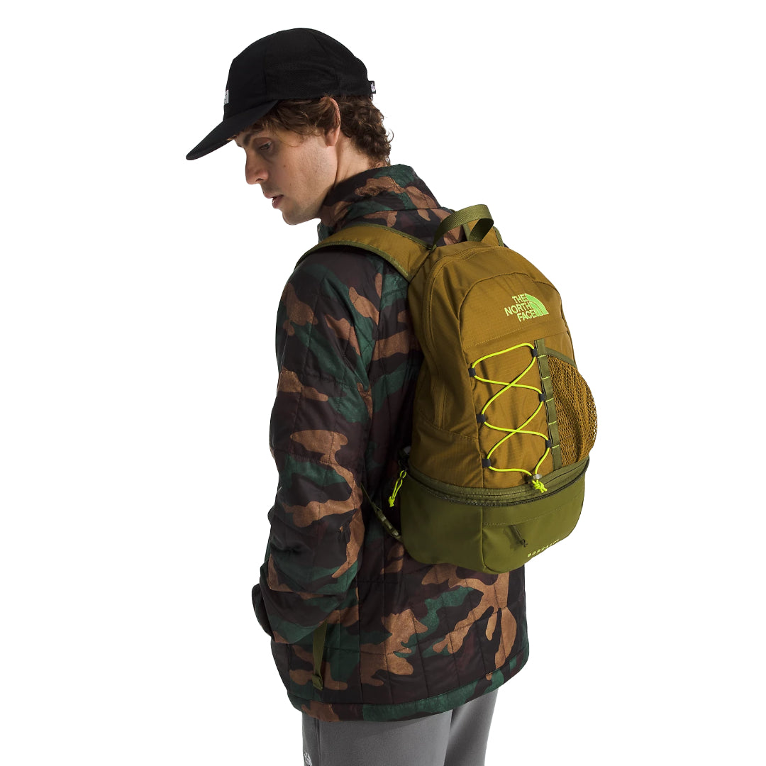 The North Face Borealis Convertible Pack , showcasing its versatile design that allows it to be used as a backpack or tote.
