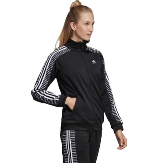 Stand out in style with adidas Originals Women's Track Top, a sporty and chic jacket featuring the iconic trefoil logo for a fashionable edge.